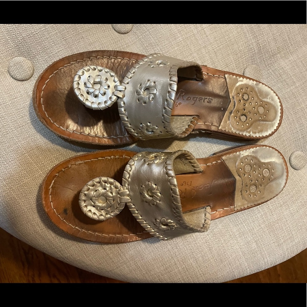 Well loved gold Jack Rogers sandal